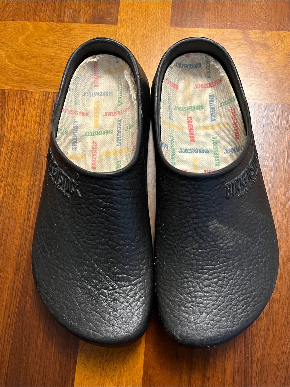 Birkenstock Black  man’s Slip-On Clogs with Logo Insole, 41 European, 26.5 USA